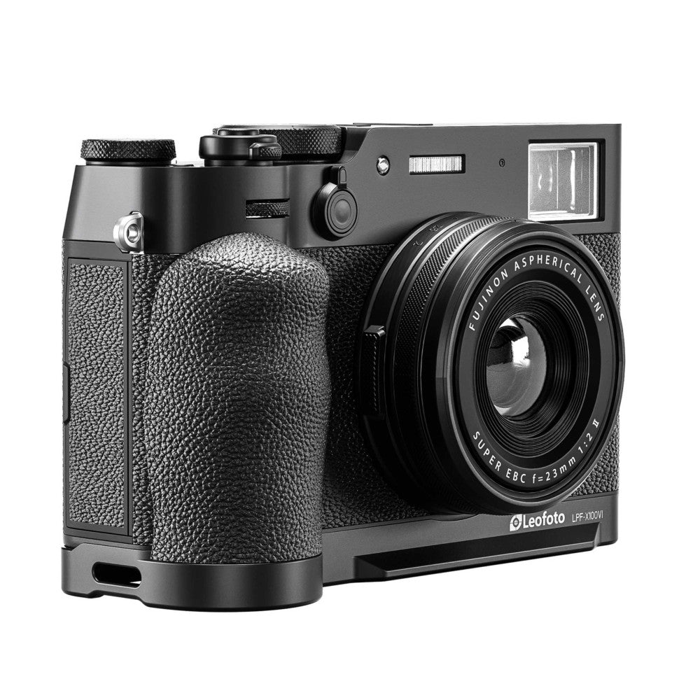 Black L-bracket mounted on Fujifilm X100VI camera, shown from three-quarter angle displaying the grip and lens mount design.