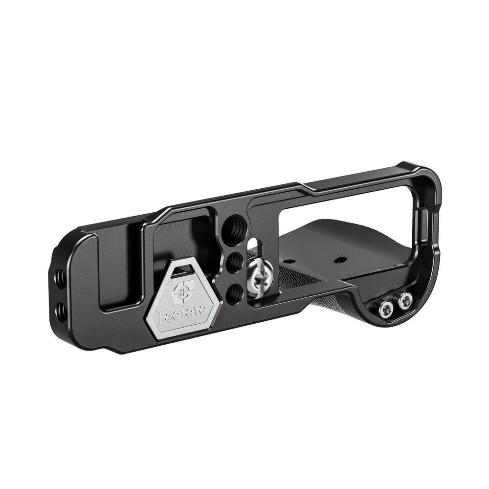 Side view of black L-bracket with silver hexagonal logo plate, showing grip texture, mounting holes, and open frame design against white background.