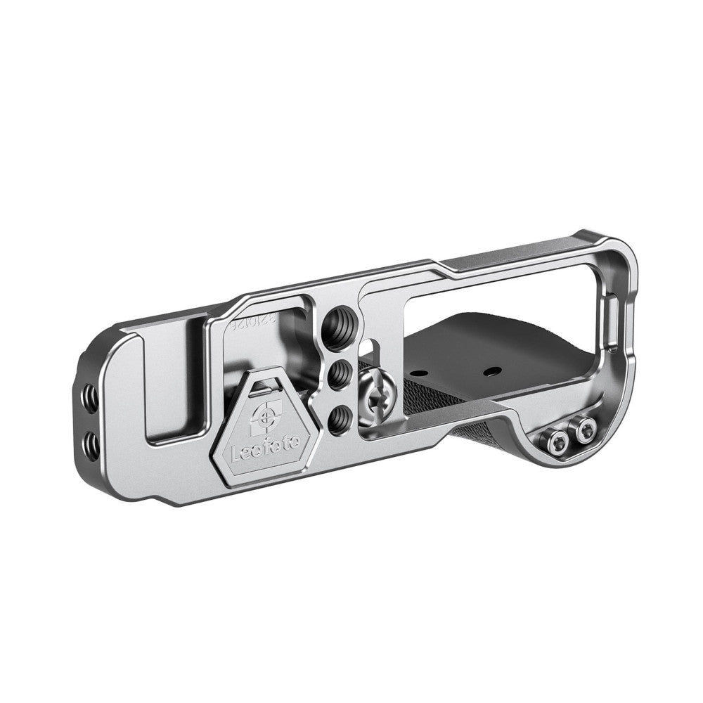 Side view of a silver aluminum L-bracket with mounting holes and internal mechanical components visible through the open frame design.
