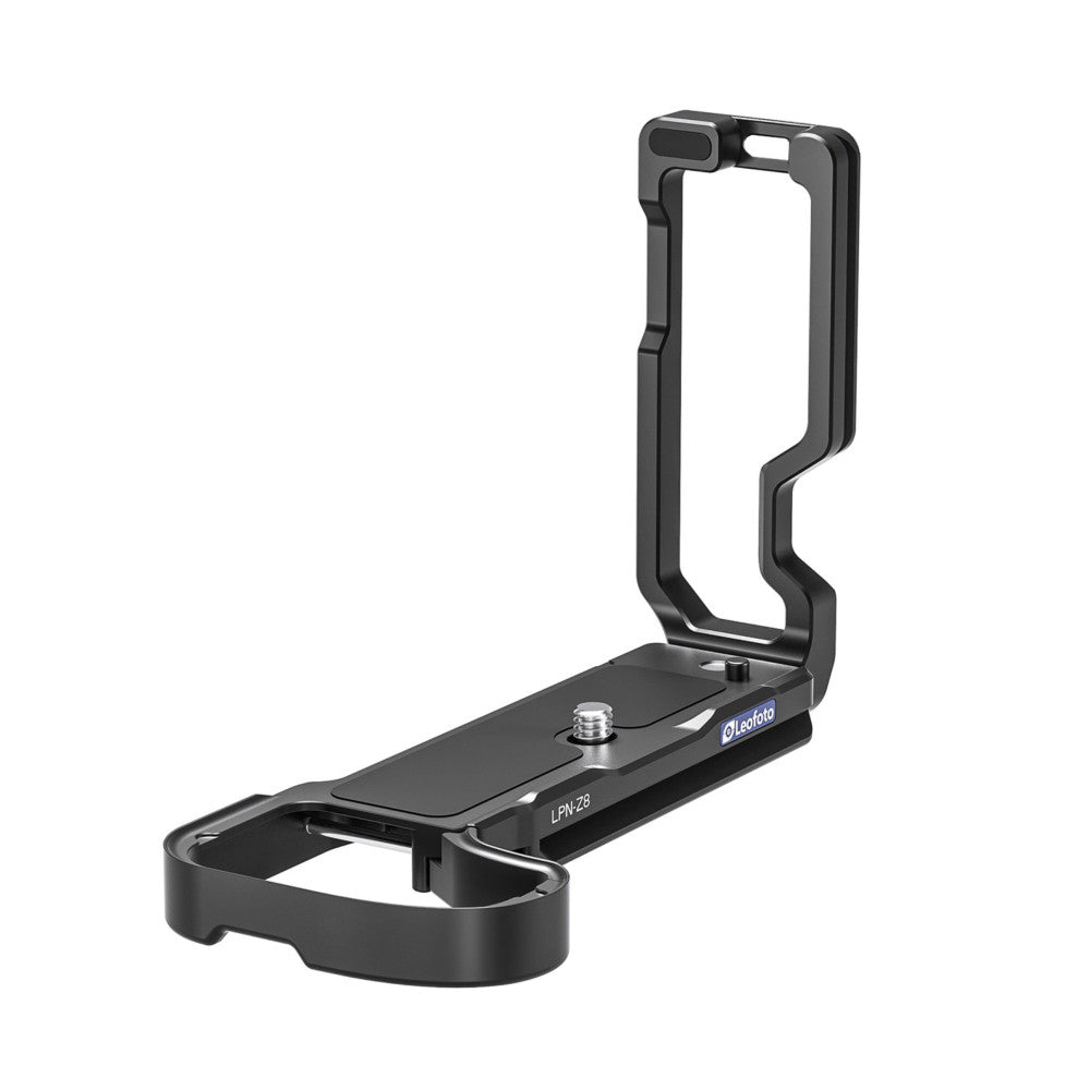 Black L-bracket for camera shown from side angle with vertical grip handle and horizontal base plate with tripod socket.