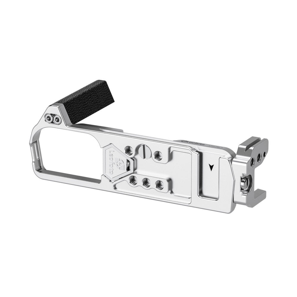 Side view of silver metal L-bracket with black foam grip handle and mounting points for camera attachment.