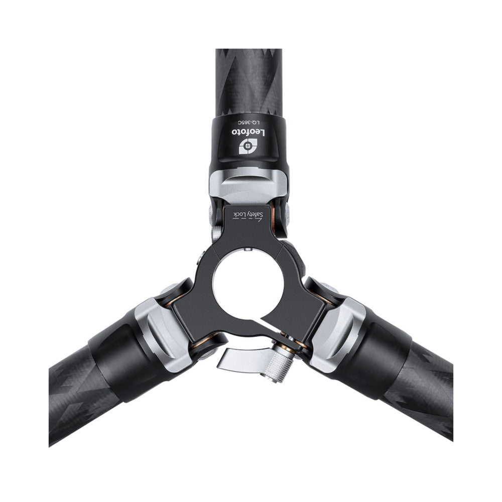 Close-up top-down view of Leofoto tripod legs and ball head junction, showing carbon fiber construction and metal hardware details against white background.
