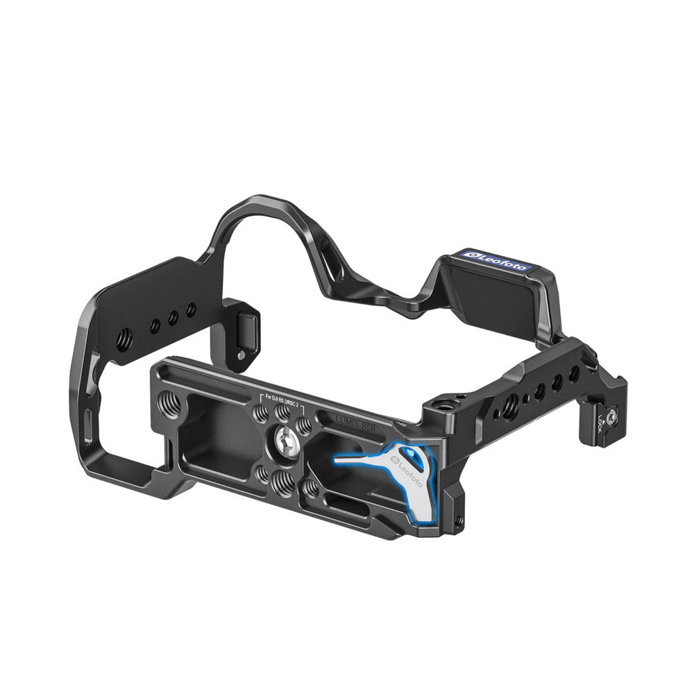 Black camera cage with blue accents shown in isometric view, displaying mounting points, handles, and attachment arms for LUMIX S5II camera.