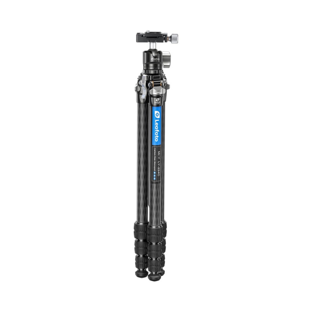 Full-length front view of a black carbon fiber tripod with blue accent band and ball head mounted on top, legs collapsed.