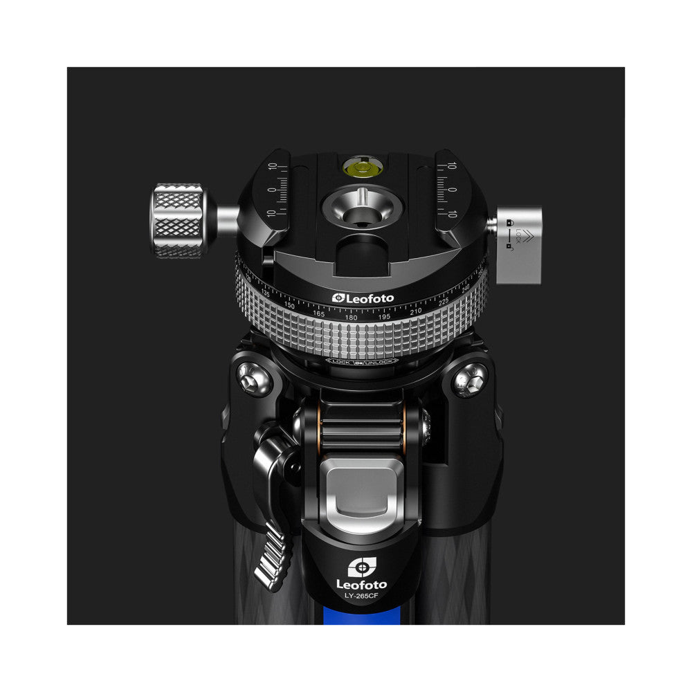 Top-down view of Leofoto ball head showing panoramic rotation scale, spirit level, and quick-release plate mechanism against dark background.
