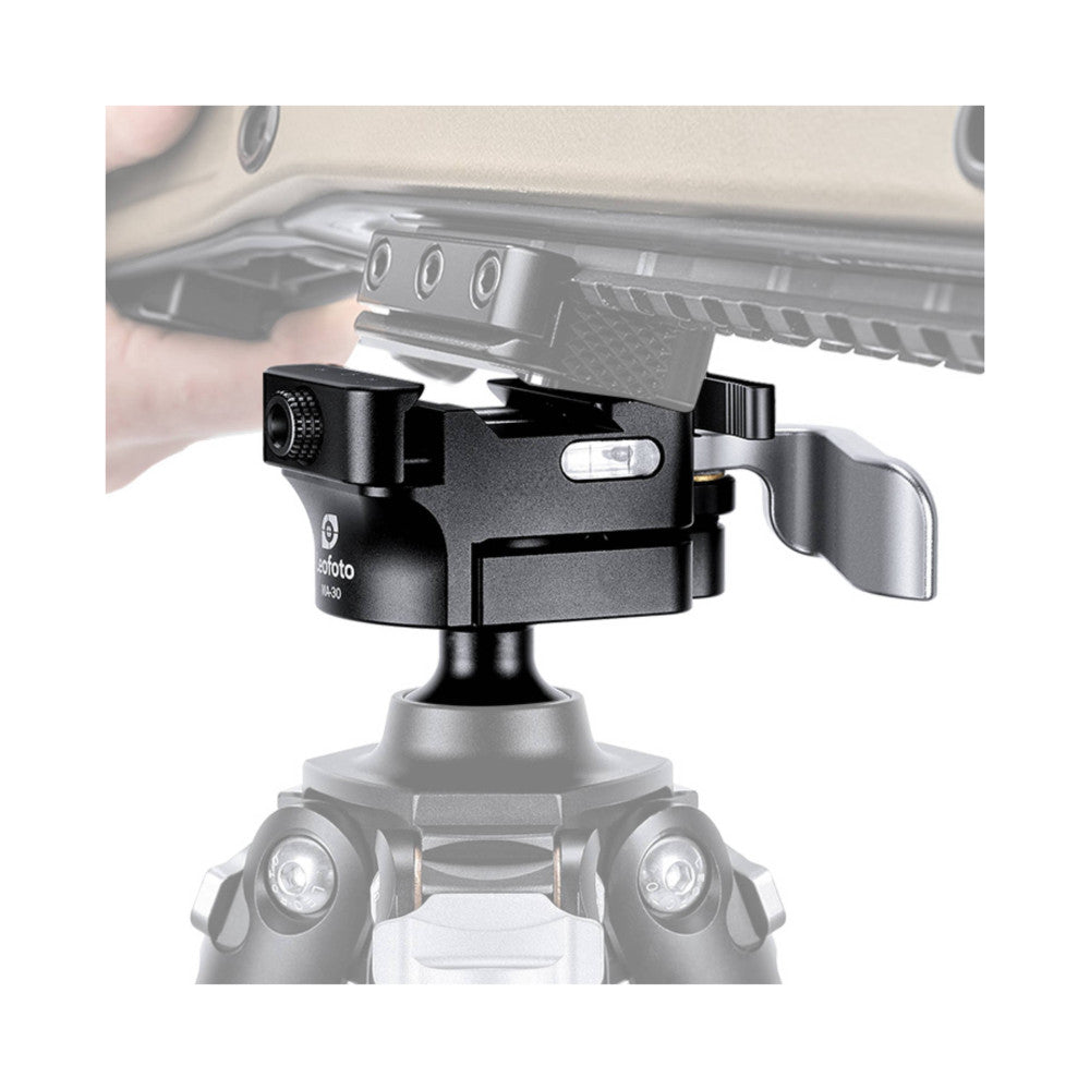 Black ball head mounted on tripod shown from front angle with adjustment knobs and quick-release plate visible.