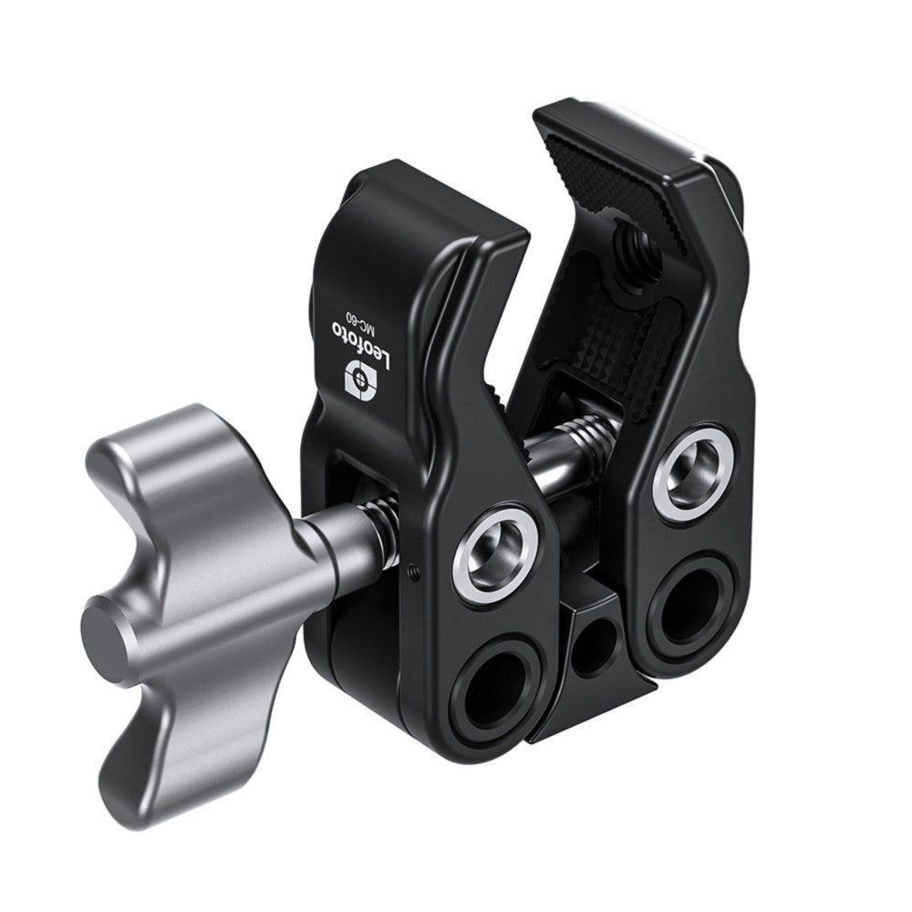 Isometric view of Leofoto MC-60 clamp showing silver knob on left and black dual-pivot head with mounting holes on right.