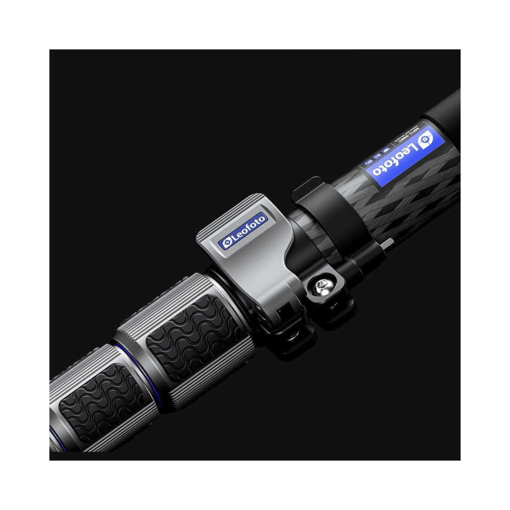 Close-up angled view of Leofoto carbon fiber monopod sections showing textured grip, silver hardware, and blue branding details against black background.