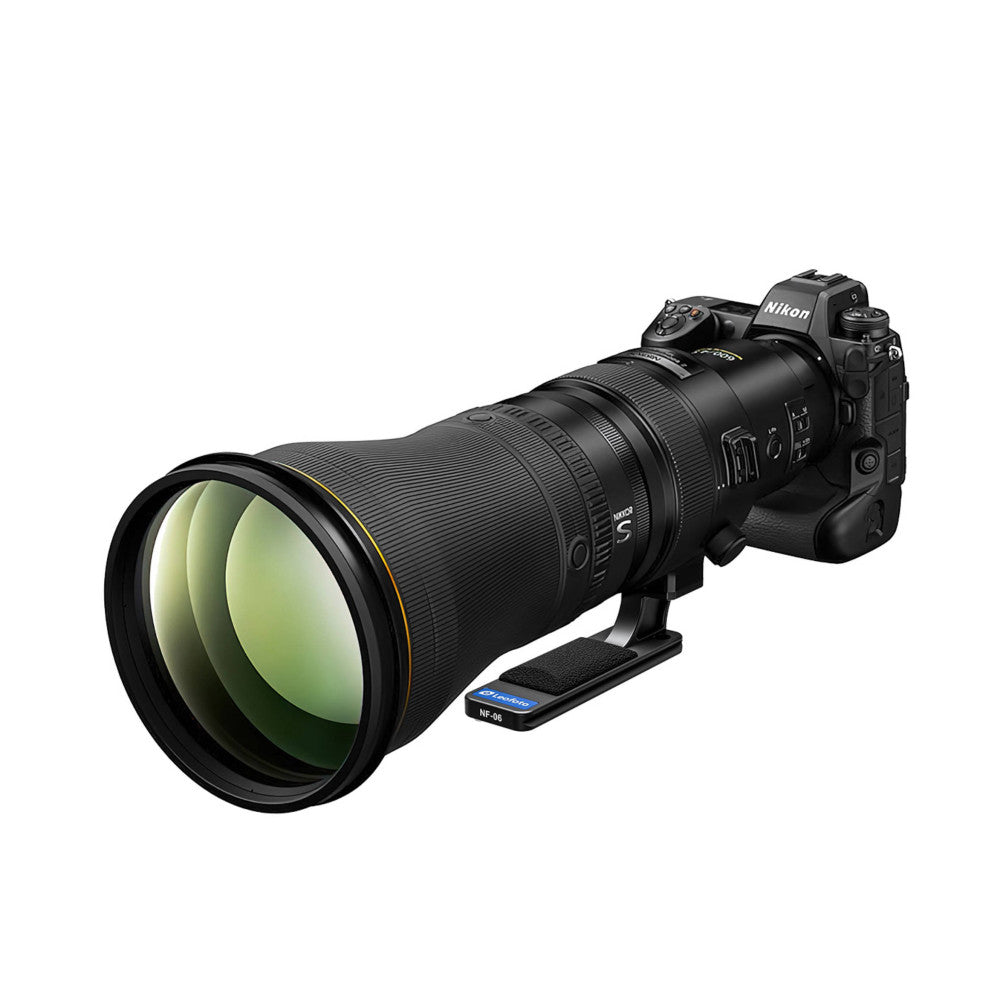 Nikon Z mirrorless camera with large telephoto lens mounted on Leofoto NF-06 tripod foot, shown in profile against white background.