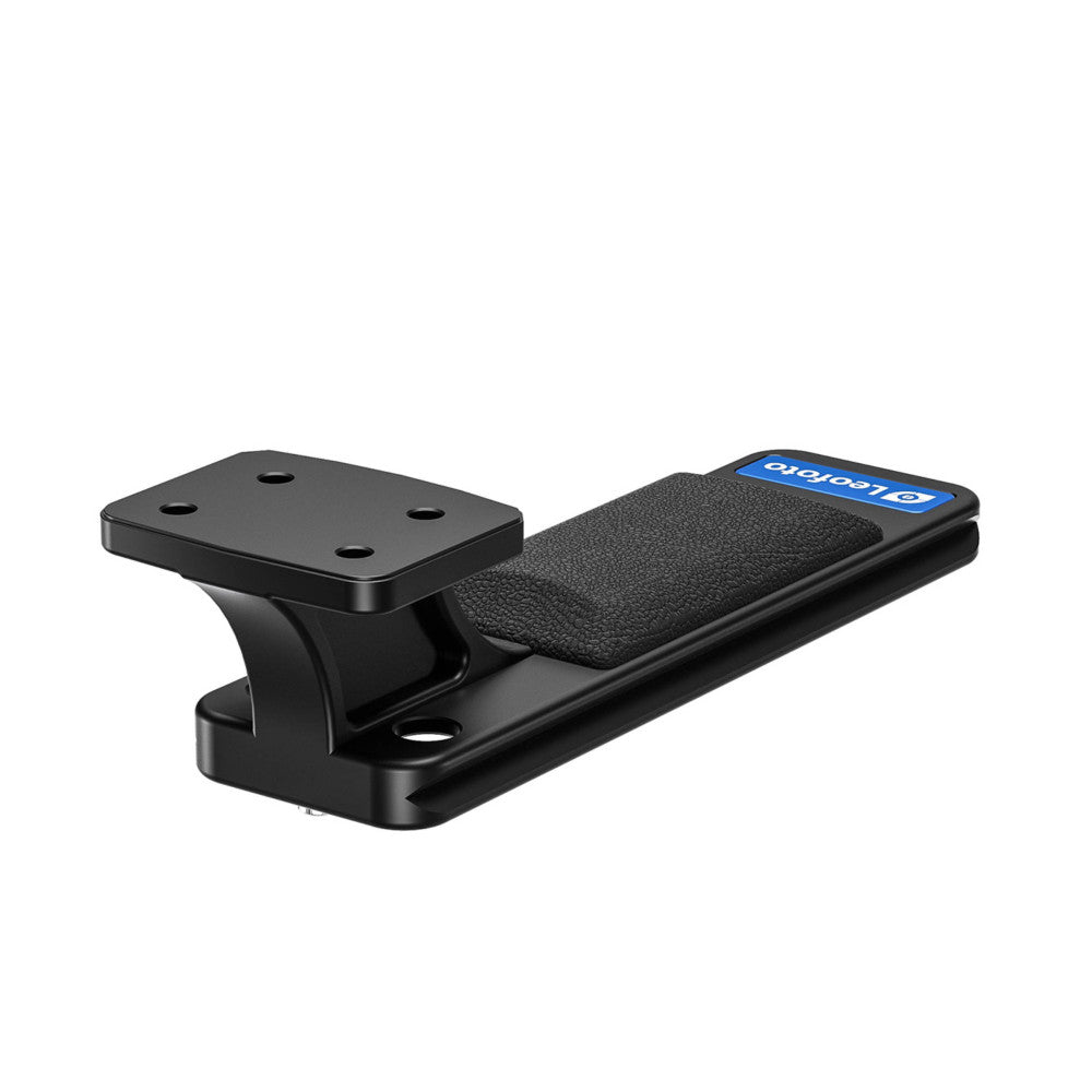 Black Arca-Swiss lens foot with mounting plate and textured grip pad shown at three-quarter angle on white background.