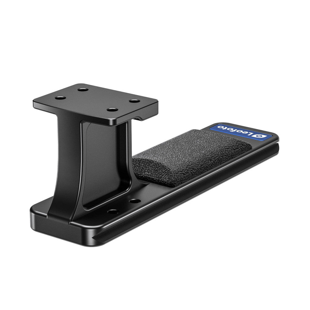 Black Leofoto NF-06 Arca lens foot shown at an angle, displaying the mounting plate top and textured foot platform with blue label.