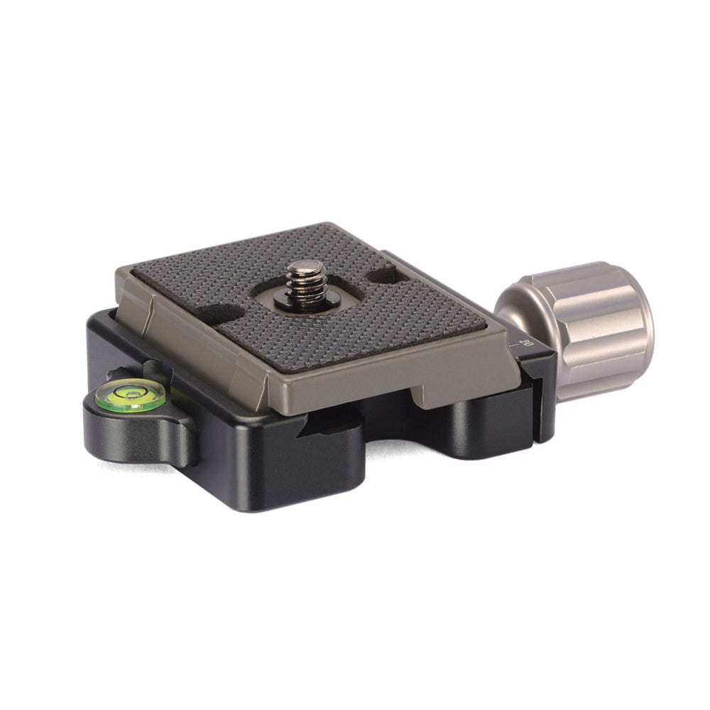 Black and silver Arca Swiss quick release plate with textured top surface, 1/4" screw, and integrated bubble level, shown at three-quarter angle.