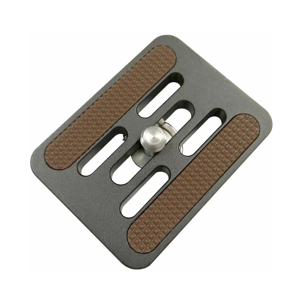 Top-down angled view of a gray rectangular camera quick-release plate with brown textured grip pads on sides and a silver ball-head mount in the center.