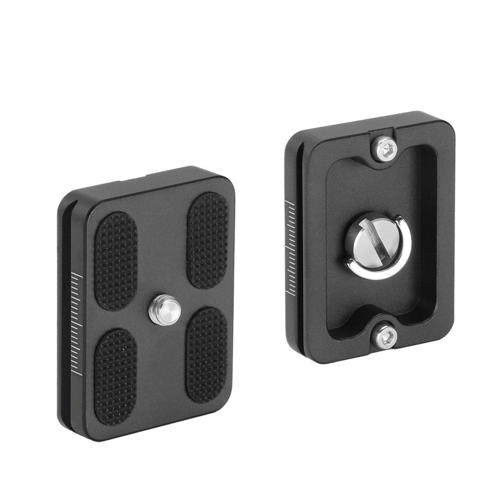 Two black Arca Swiss quick-release plates shown at different angles, displaying textured surfaces and metal attachment knobs.
