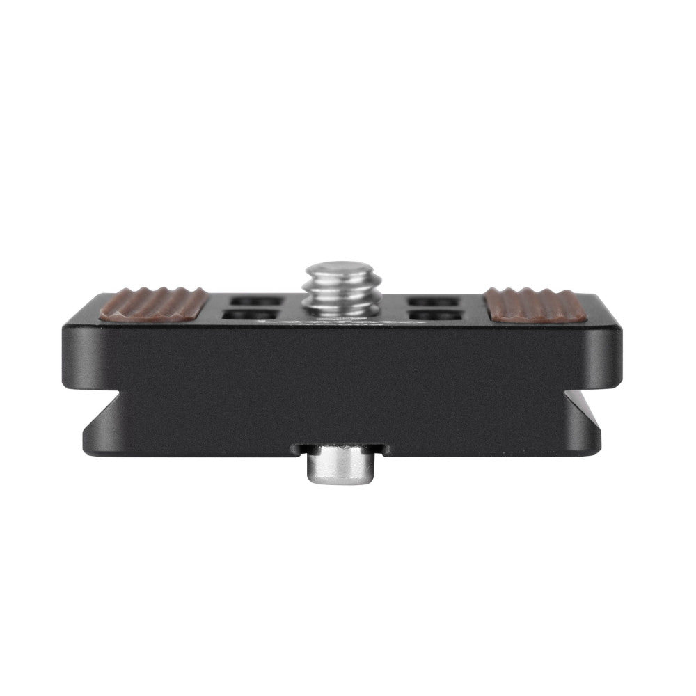 Top view of black Arca Swiss quick release plate with brown rubber grips, center screw, and mounting socket.