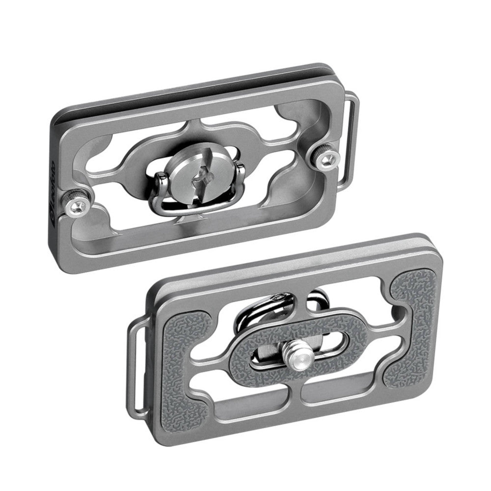 Two views of a titanium Arca Swiss quick-release plate showing the top and bottom surfaces with mounting mechanisms and grip texture.