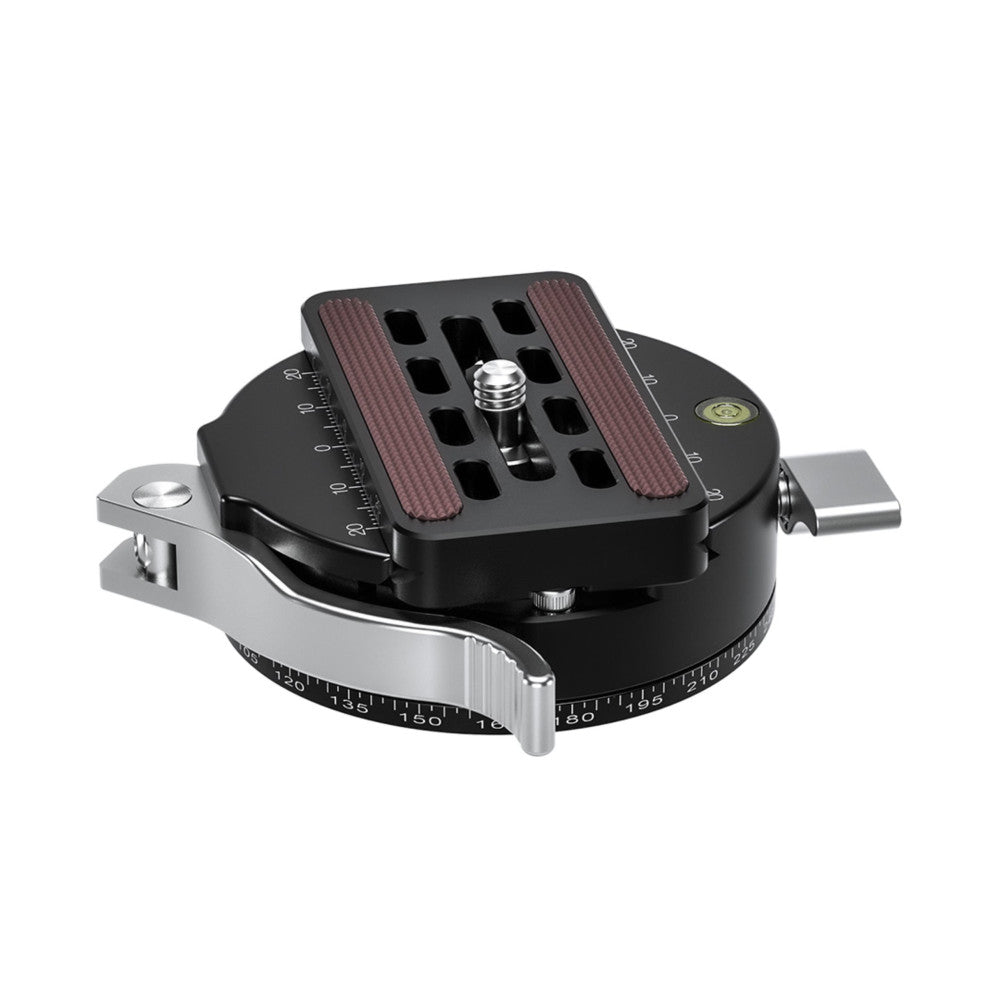 Top-down view of a professional panning clamp with circular base, showing the lever release mechanism, rubberized platform, and degree markings around the perimeter.