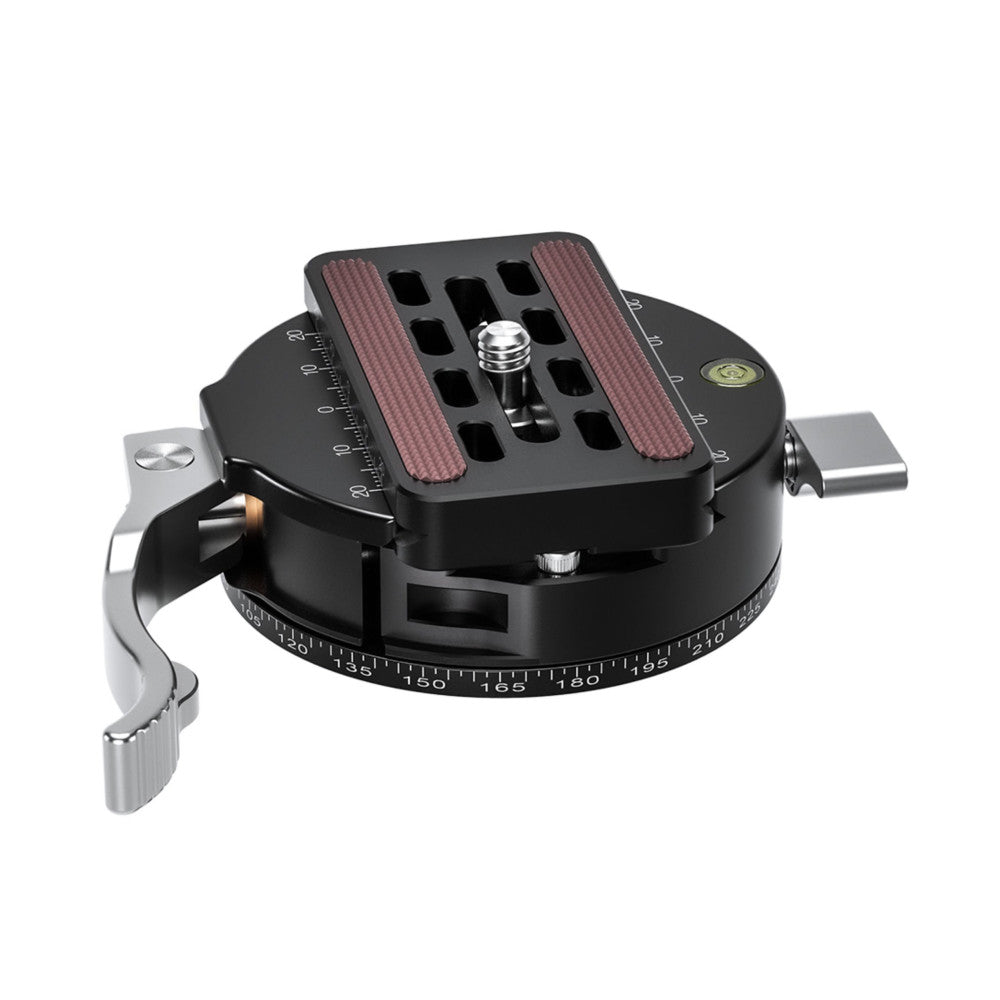 Isometric product view of a black panning clamp with circular degree markings, burgundy grip pads, and attached quick-release plate.