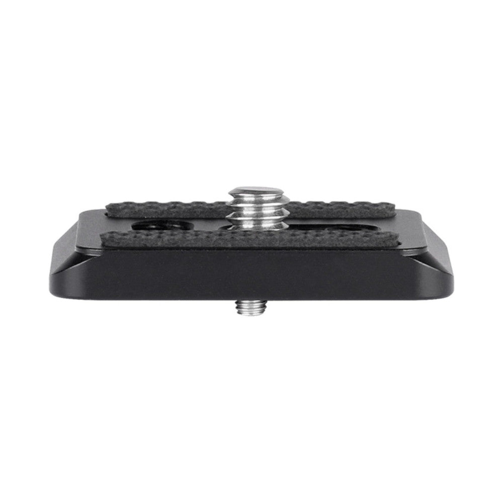 Top-down view of a black Arca Swiss quick release plate with metal screws and dark felt pads visible on the underside.