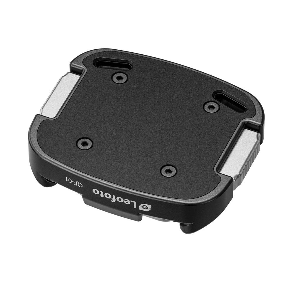 Top-down angled view of black Leofoto QF-01 Arca-Swiss quick release clamp with white pad accents and mounting holes visible.
