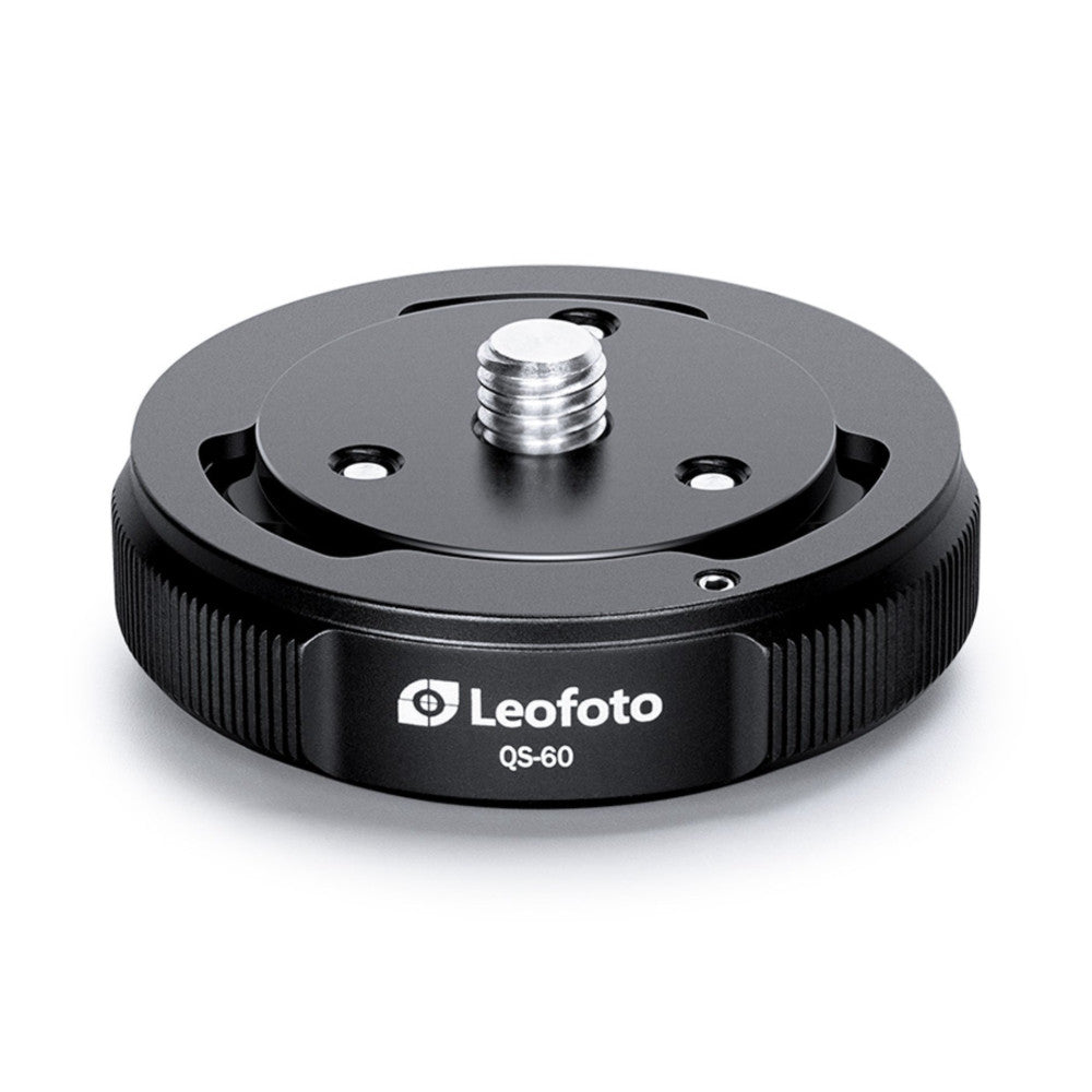 Top view of black Leofoto QS-60 quick link plate showing threaded center post and mounting holes against white background.