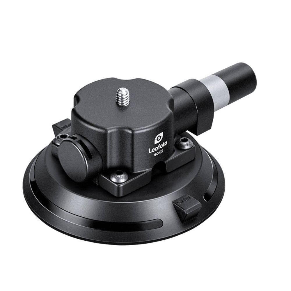Black suction cup camera mount with ball head and articulating arm, shown from above at three-quarter angle against white background.