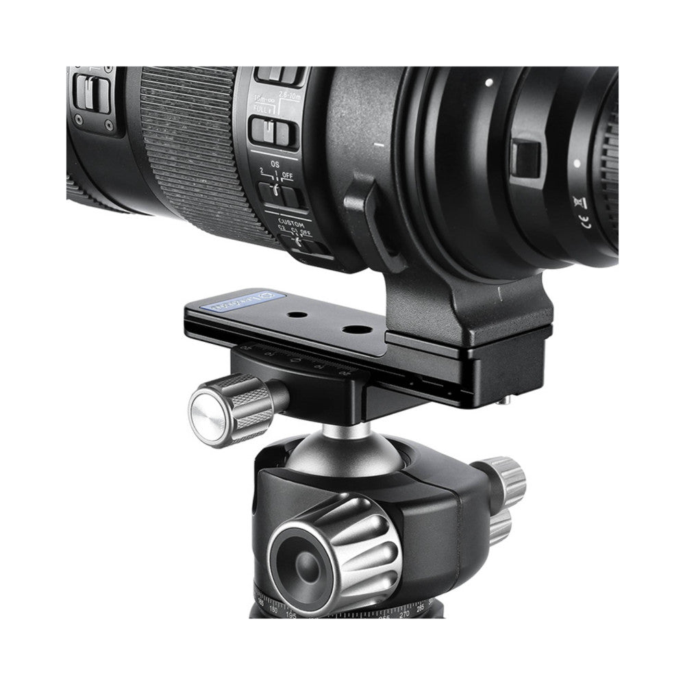 Telephoto lens with black Arca-style foot mounted on ball head, showing assembly from above angle against white background.