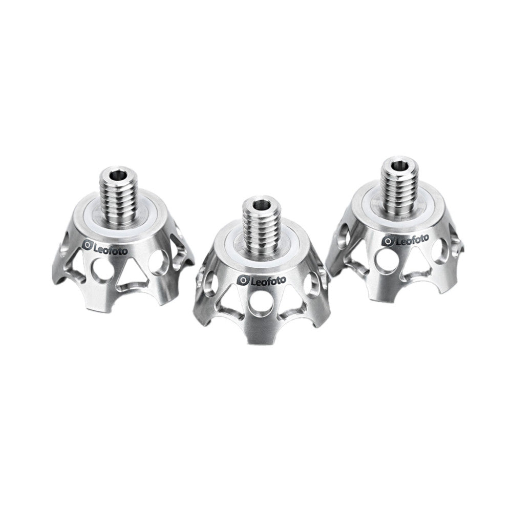 Three silver titanium tripod claws with threaded studs shown from front angle against white background.