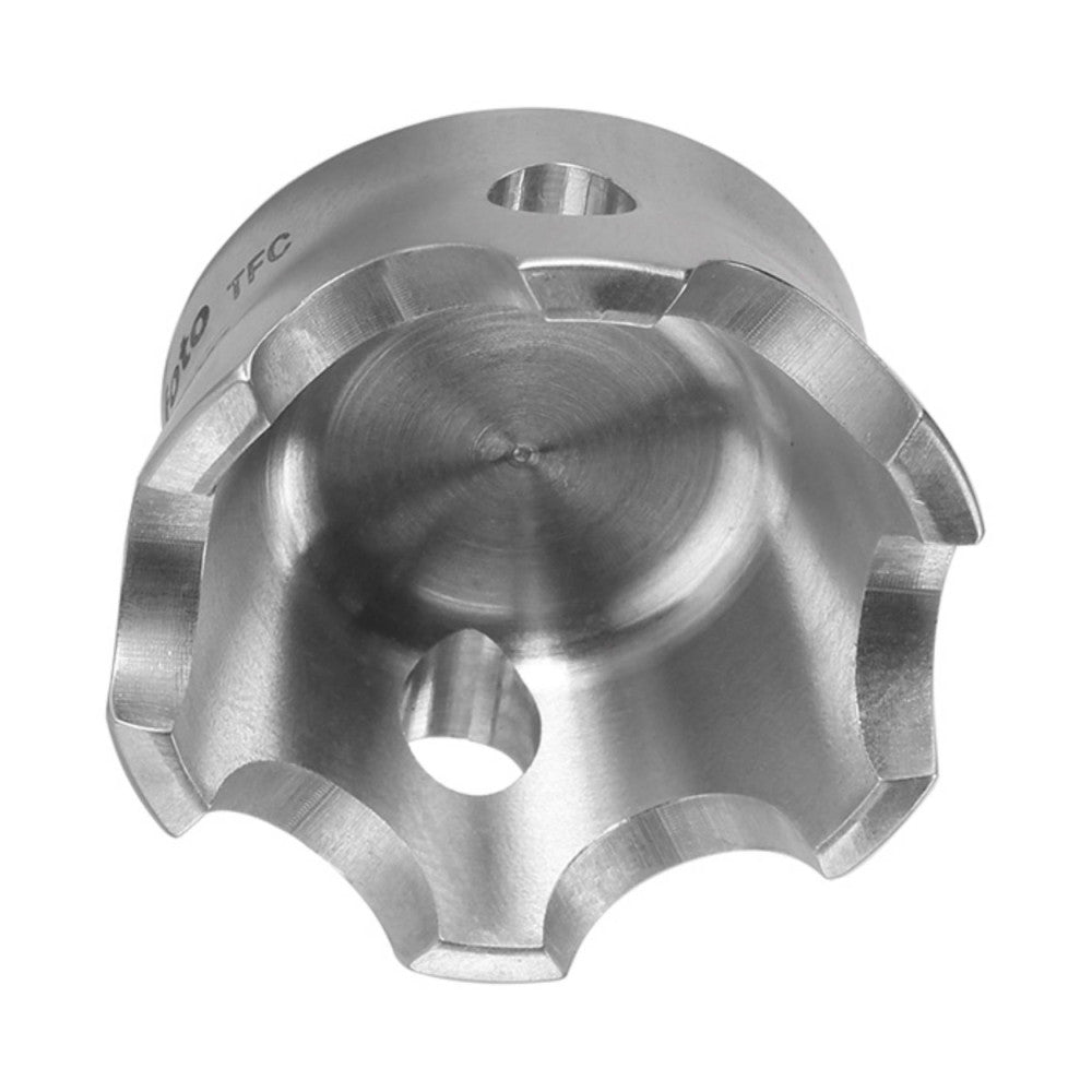 Top-down view of a metallic tripod claw adapter showing the threaded center hole and four curved gripping arms.