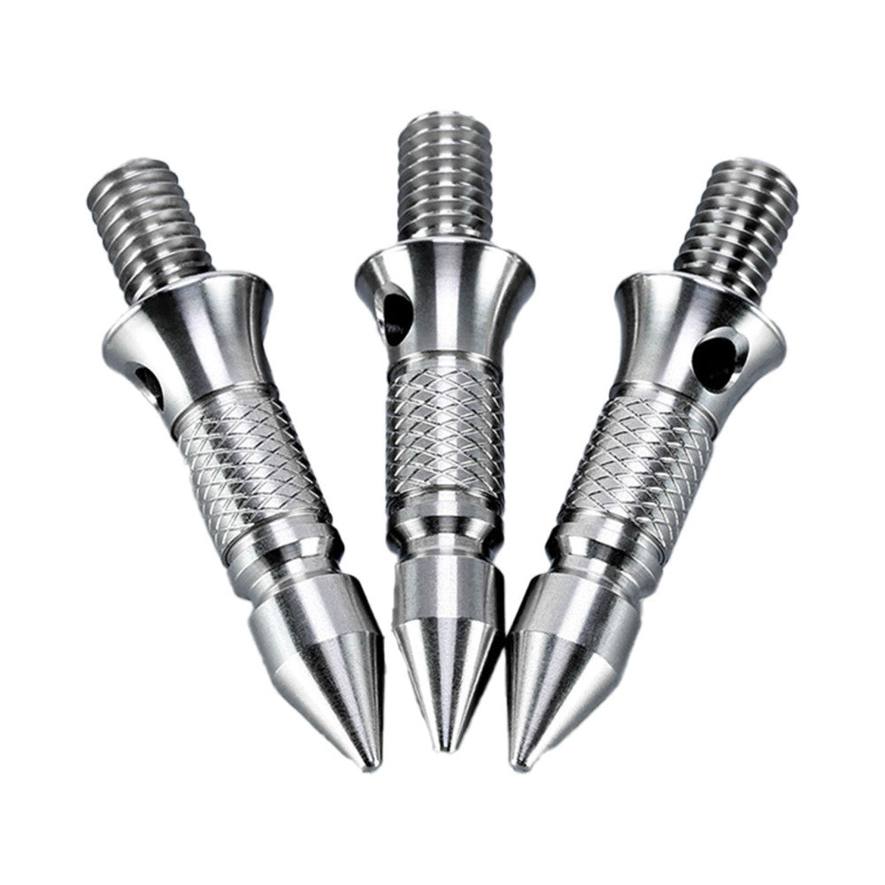 Three polished stainless steel tripod spikes with textured grip sections arranged in a V-formation against a white background, displayed straight-on to show their pointed tips and threaded tops.