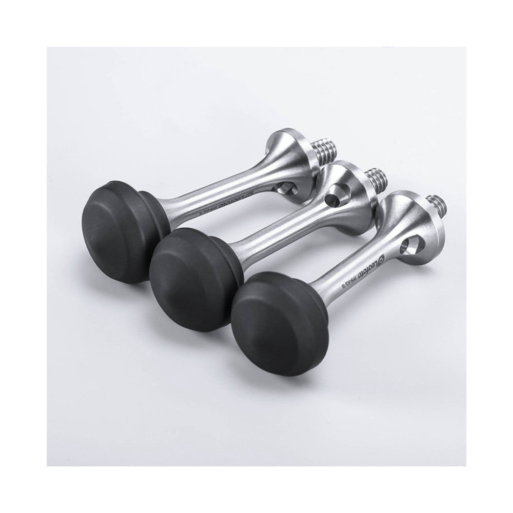 Three silver tripod spikes with black rubber feet displayed at an angle against a white background, showing the threaded mounting ends.