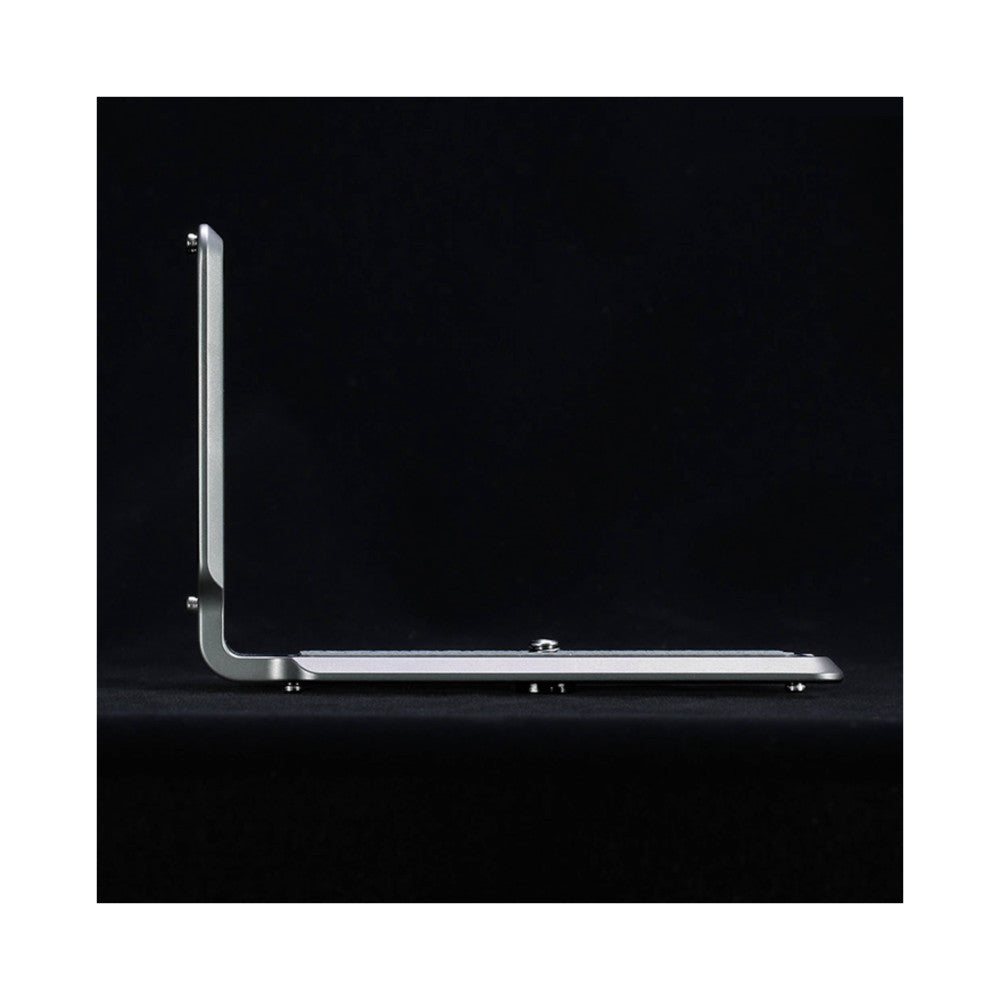 Side profile view of a silver titanium L-bracket against a black background, showing its right-angle corner design and mounting points.