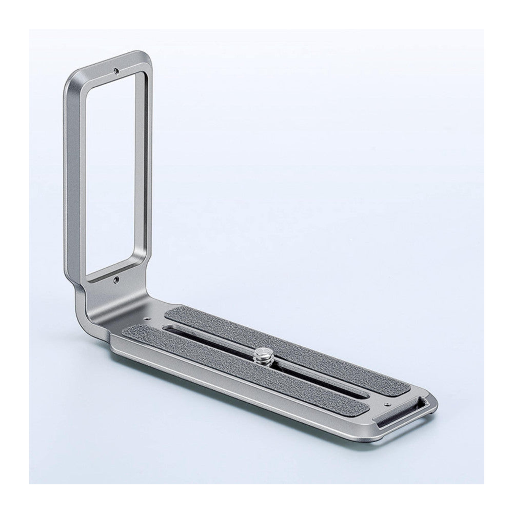 L-shaped titanium bracket shown from side angle with vertical handle and horizontal base featuring textured grip pads and adjustment screw.