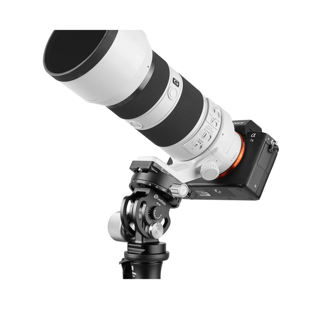 Professional camera with telephoto lens mounted on a two-way monopod head against a white background, shown at an angled side view.