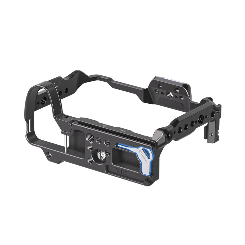 Black aluminum camera cage with blue accents shown at three-quarter angle, featuring multiple mounting holes and side handles for Fujifilm X-H2 camera.