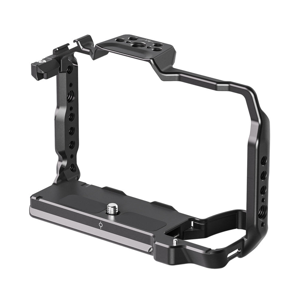 Black aluminum camera cage with mounting plate and accessory shoe, shown at three-quarter angle against white background.