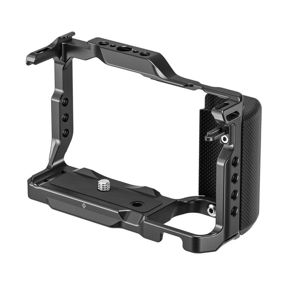 Black aluminum camera cage with textured grip panel shown in three-quarter view against white background.