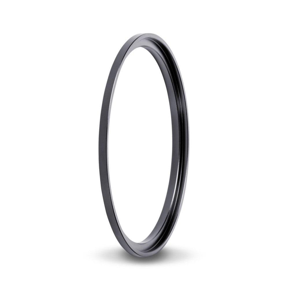 Dark gray metal adapter ring photographed at an angle against a white background, showing its circular opening and depth.