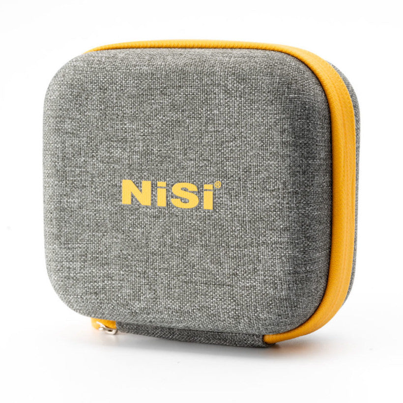 Gray fabric carrying case with yellow trim and "NiSt" branding, shown at three-quarter angle against white background.