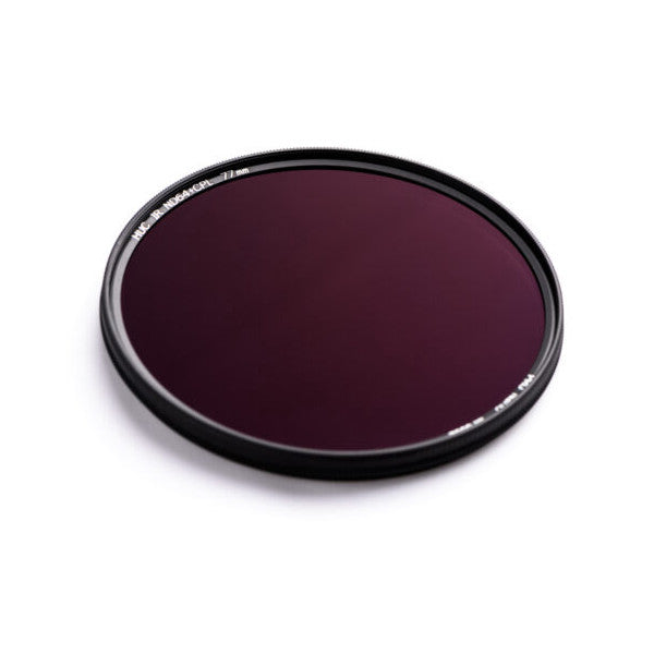 Circular optical filter with dark purple-tinted glass in black metal frame, photographed at a slight angle against white background.
