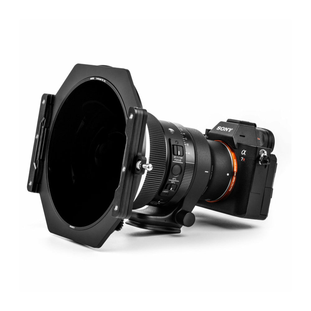 NiSi S6 filter holder mounted on Sony mirrorless camera with Sigma 14mm lens, angled side view against white background.
