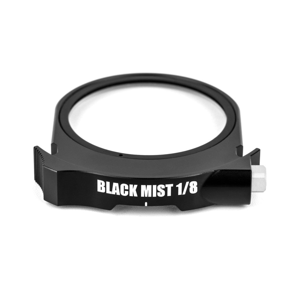 Black circular filter ring with "BLACK MIST 1/8" label visible on the front-facing side, shown at a slight angle against white background.