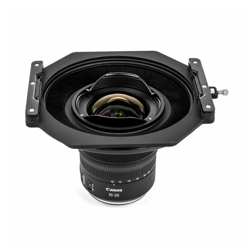 Top-down view of NiSi S6 filter holder mounted on Canon RF 10-20mm lens, showing square holder with side handles and focal length markings.
