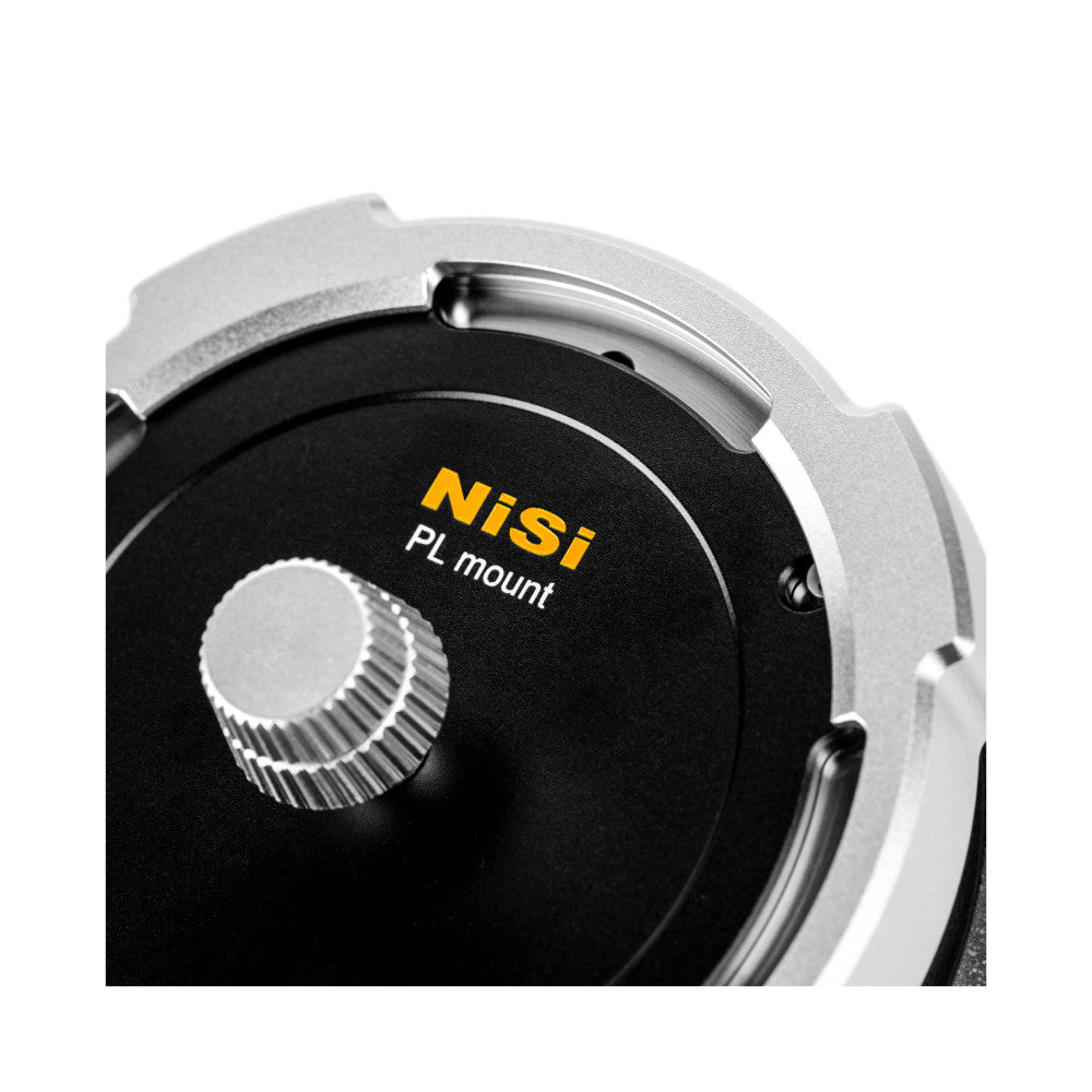 Close-up detail view of NiSi PL mount adapter showing white housing, black center ring with yellow branding, and metal gear mechanism against white background.