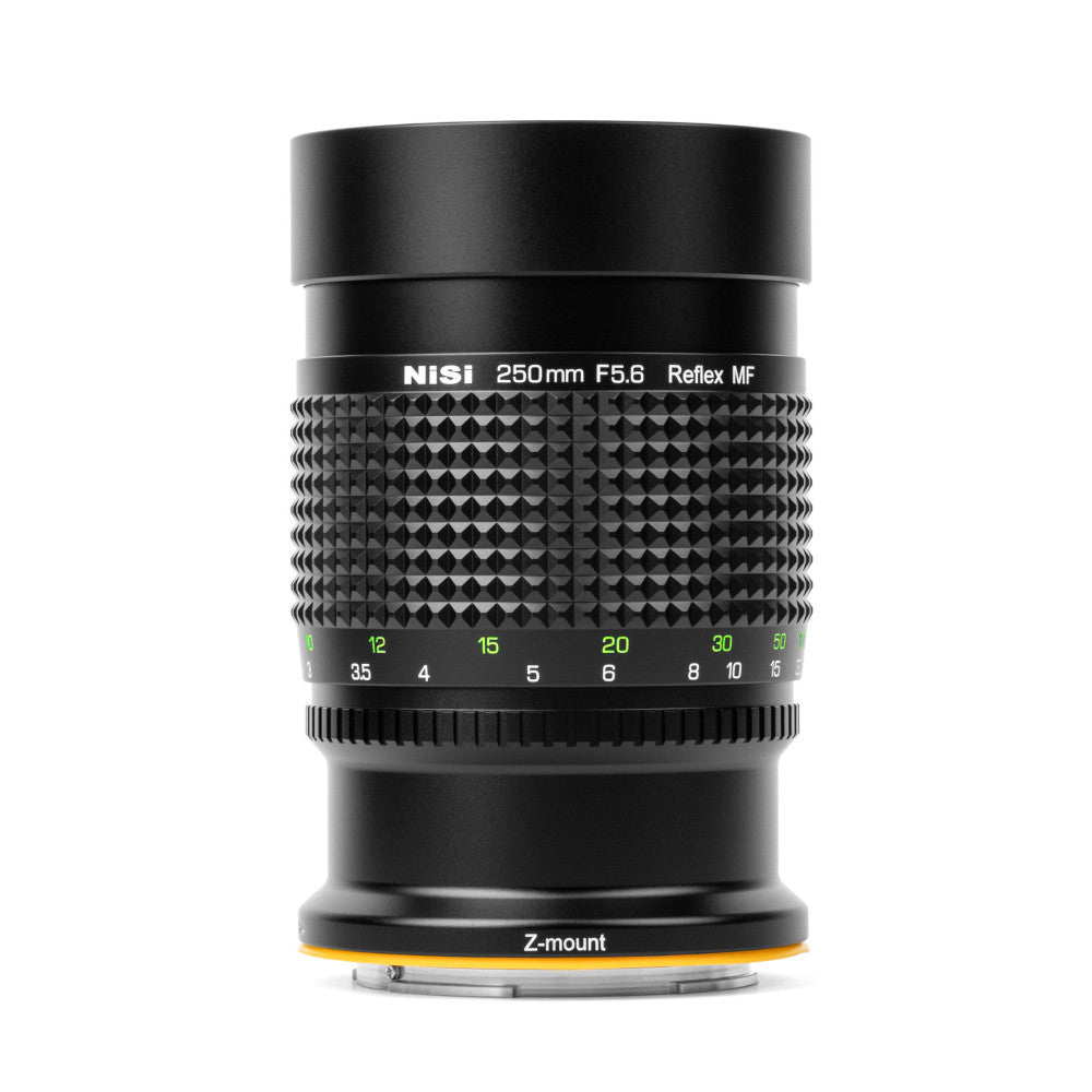 Front view of NiSi 250mm f/5.6 Reflex MF lens with textured grip barrel, focus ring with distance markings, and Z-mount base visible.