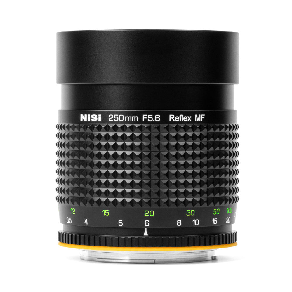 Front view of NiSi 250mm F5.6 Reflex MF lens showing barrel with focus ring, distance scale markings, and yellow accent ring at base.