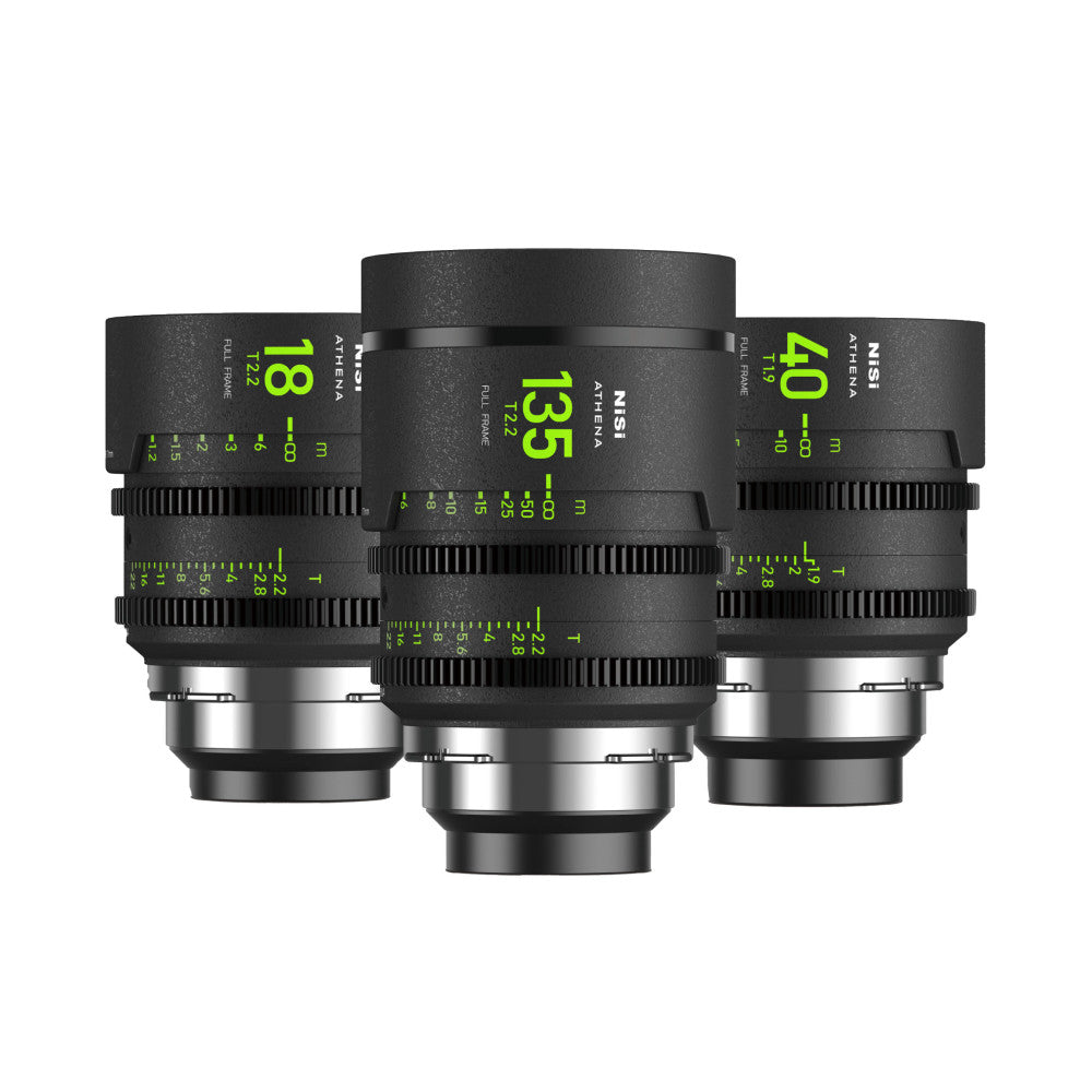Three black cinema lenses with green focal length markings arranged in front view, showing 18mm, 35mm, and 40mm focal lengths with silver metallic mounts.
