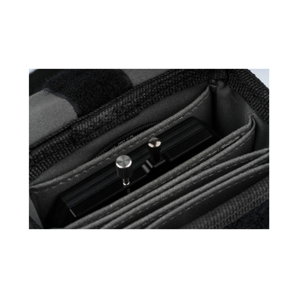 Close-up detail of NiSi M75-II filter holder showing metal adjustment knob and CPL filter mechanism with black fabric case.