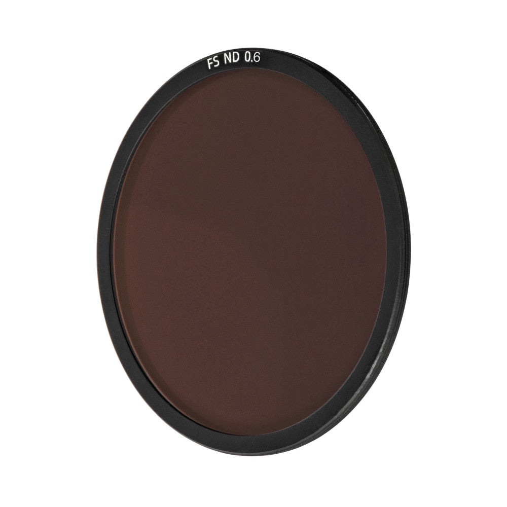 Front view of a circular NiSi ND filter with dark brown tinted glass and black aluminum ring, labeled "FS ND 0.6" at the top.