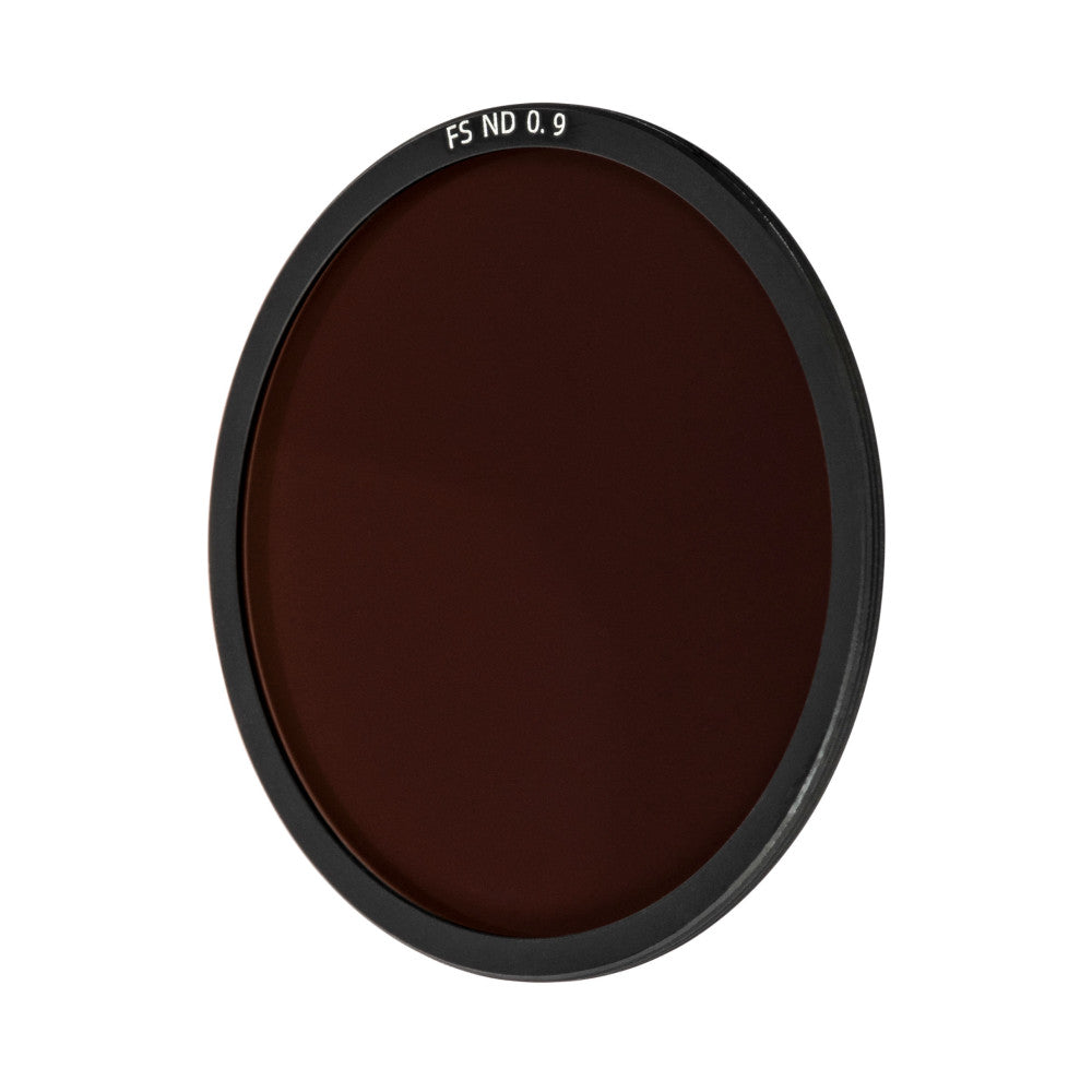 Front view of a circular dark brown optical filter with black aluminum ring, labeled "FS ND 0.9" at the top.